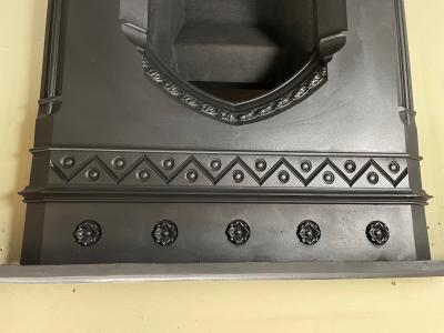 Antique Gothic cast iron fireplace - close
