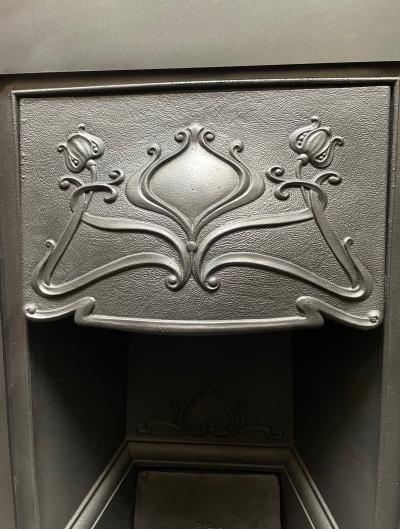Antique bedroom Art Nouveau fireplace - close