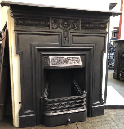 Antique combination fireplace with large grate