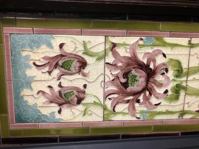 Antique tiled interior with William De Morgan tiles - tiles close