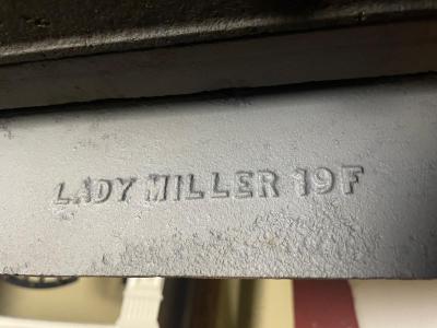 lady miller name on back of fireplace