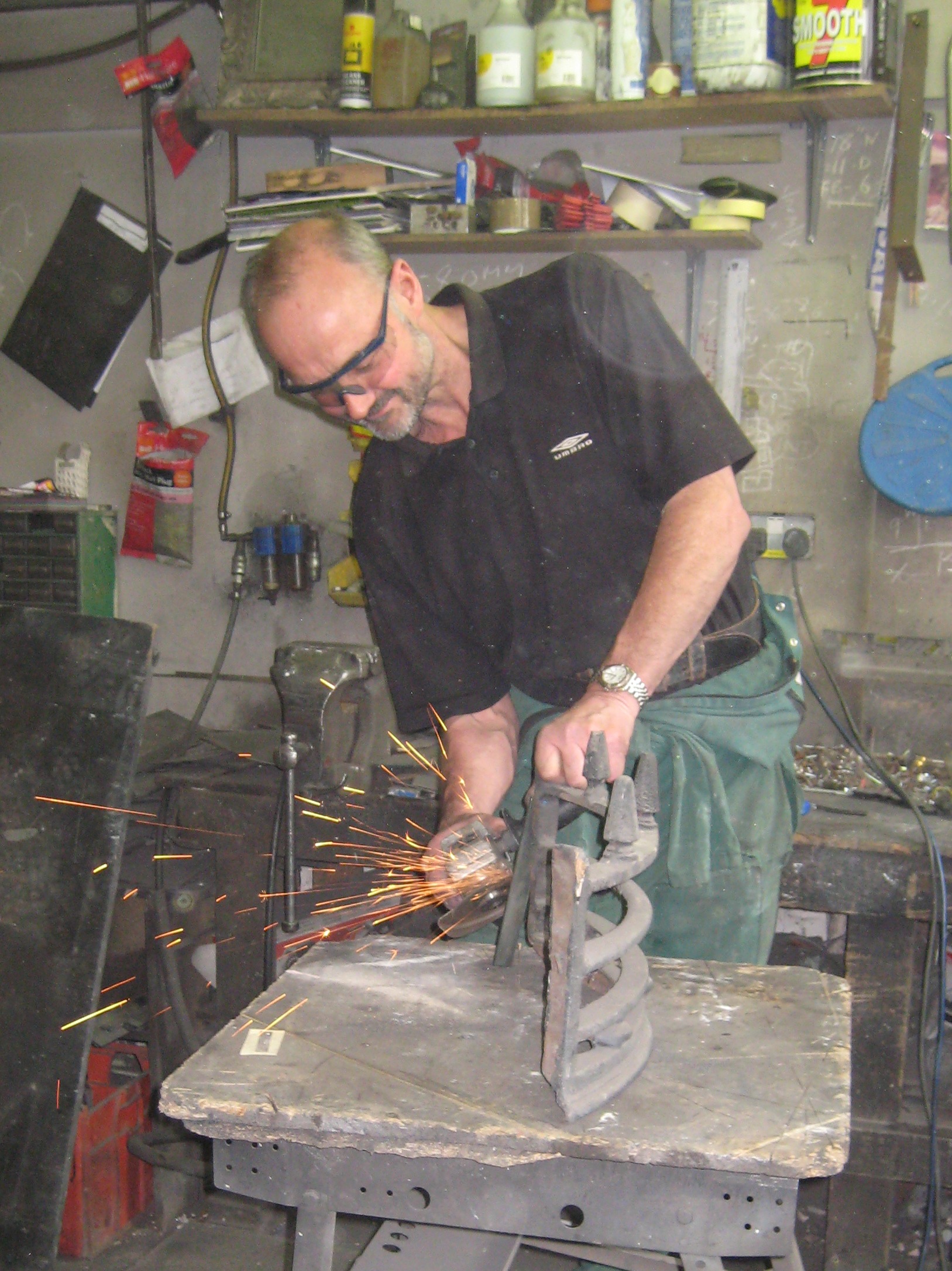 Using a grinder on a firegrate