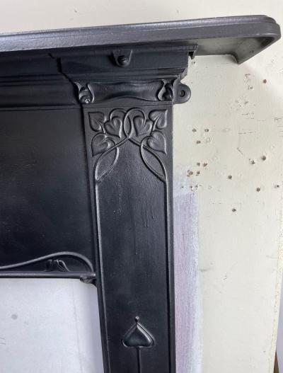 Antique Art Nouveau design stove fire surround - corner