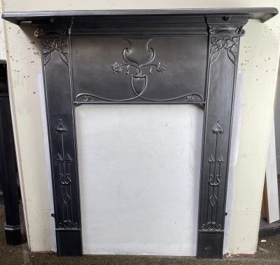 Antique Art Nouveau design stove fire surround