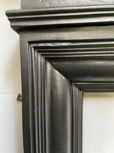 Antique Edwardian cast iron stove surround - corner