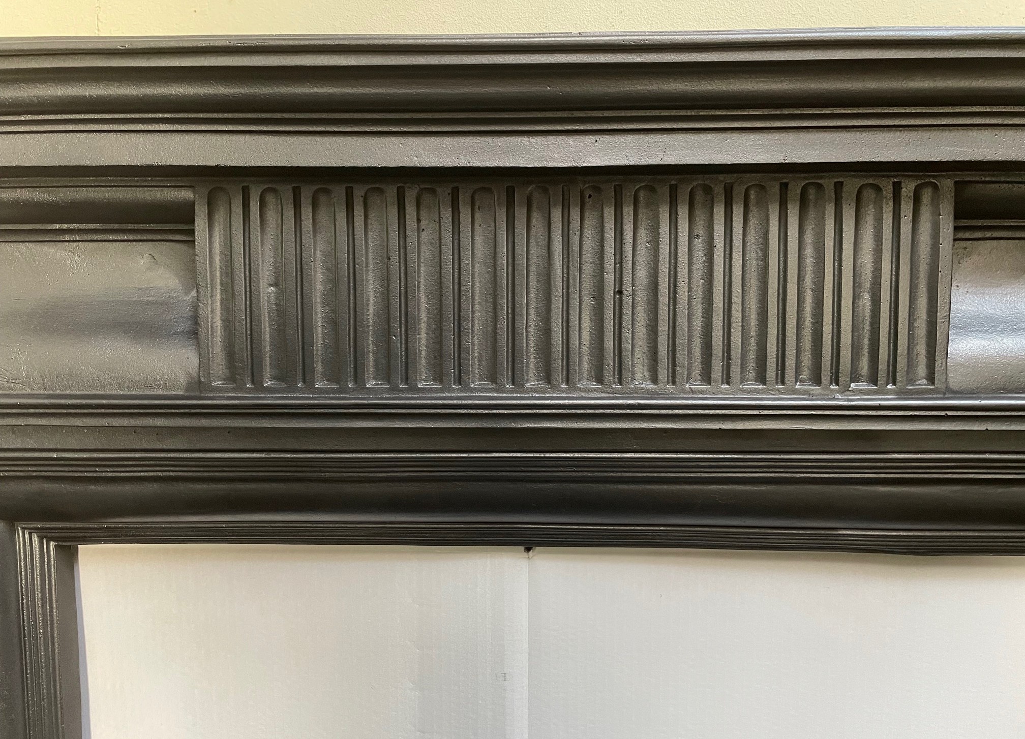 Antique Edwardian cast iron stove surround - detail