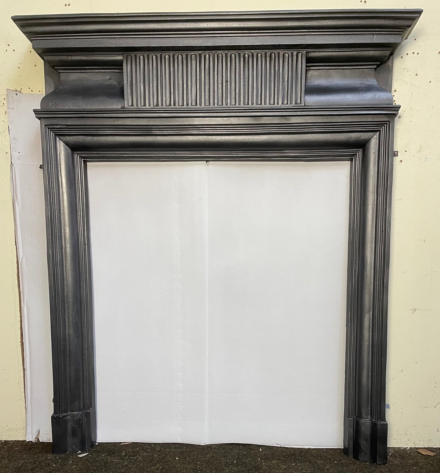 Antique Edwardian cast iron stove surround