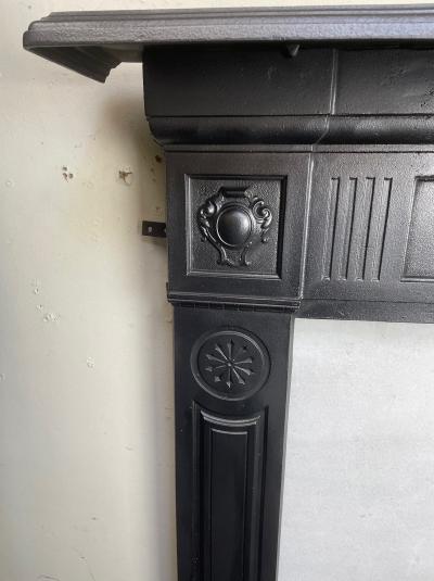 Antique Edwardian cast iron stove surround - corner