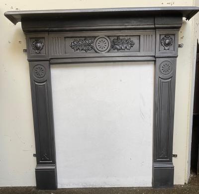 Antique Edwardian cast iron stove surround