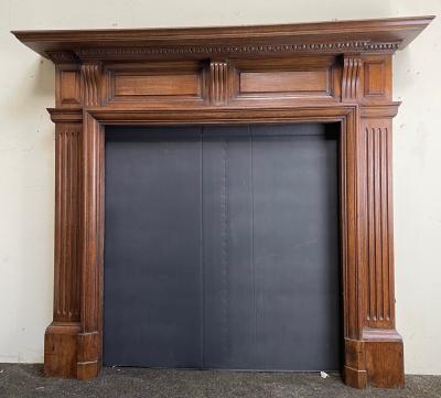 Antique late Victorian/ Edwardian oak fire surround