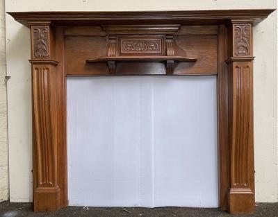Antique Late Victorian oak fire surround