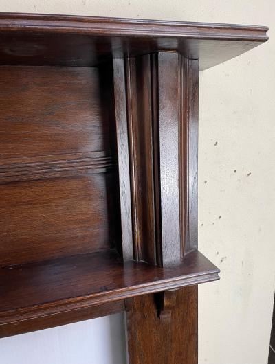 Antique Arts & Crafts oak fire surround - corner