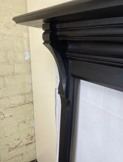Antique wood fire surround - corner
