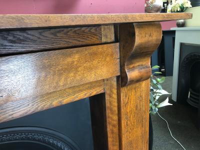 Antique Edwardian / Victorian oak fire surround - corner