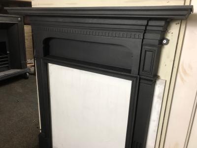 Antique cast iron Art Nouveau stove fire surround - top