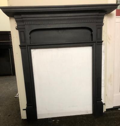 Antique cast iron Art Nouveau stove fire surround