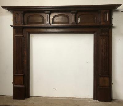 Antique late Victorian / Edwardian oak fire surround