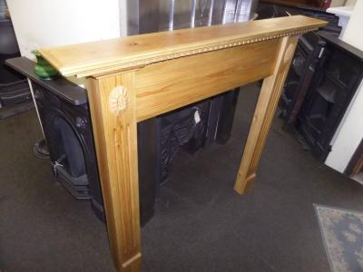 britain`s heritage pine wood fireplace surround